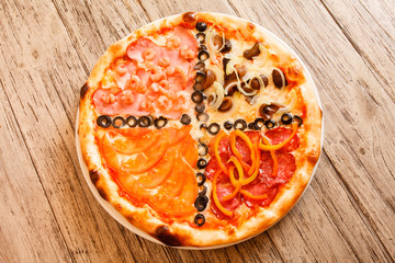 pizza on wooden background