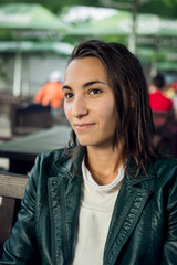 portrait of young lady sitting at a table