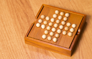 Madagascar checkers on a wooden table