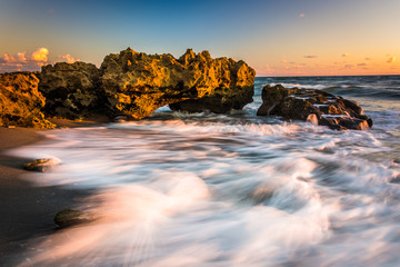 Waves and coral at sunrise in the Atlantic Ocean at Coral Cove P © jonbilous