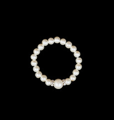 White pearls on the black background
