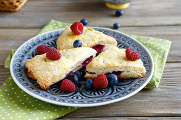 Sweet Scone with raspberries on a plate