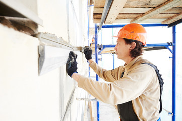 facade builder plasterer at work