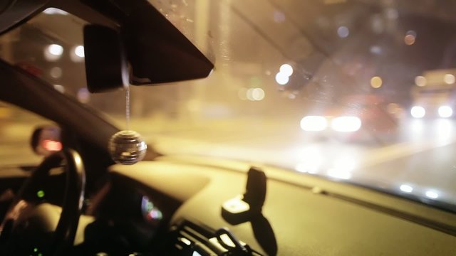Disco ball hanging in the car