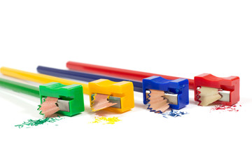 Colorful Pencil Sharpeners with Pencil Shavings Isolated