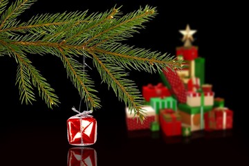 Composite image of red christmas decoration hanging from branch