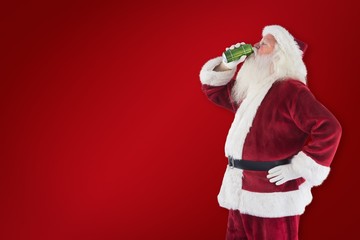Composite image of father christmas drinks beer with closed eyes - Powered by Adobe