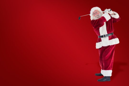 Composite image of santa playing golf