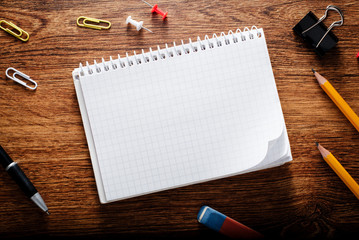 Graphing Notes with Other School Supplies on Table
