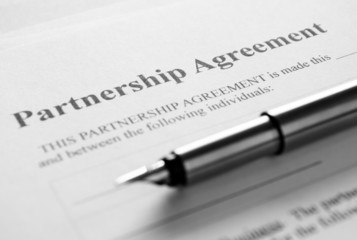 Macro Partnership Contract Paper and Pen