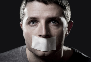 man mouth sealed on tape speech freedom concept