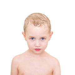 Little boy with wet soapy head isolated on white background
