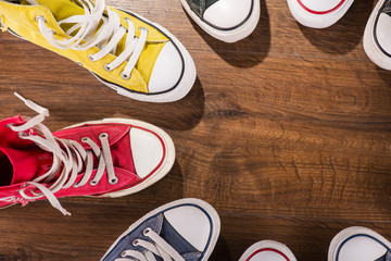 multicolored youth gym shoes on floor