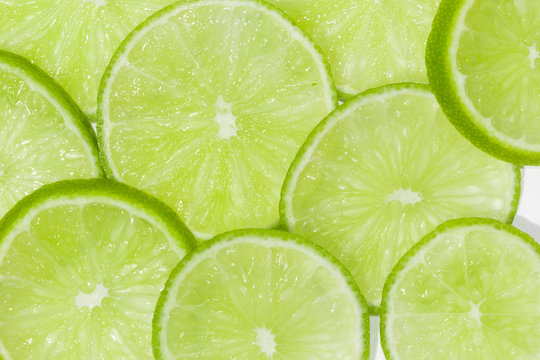 Natural green lime slices background