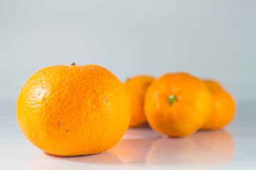 Citrus fruits  on background