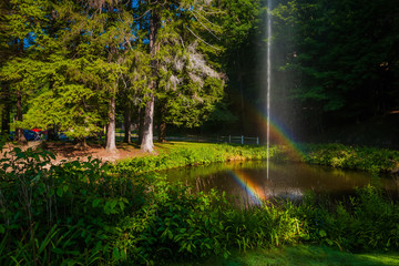 Double rainbow over pond at Letchworth State Park, New York.