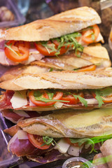 French sandwiches with ham tomatoes and cheese