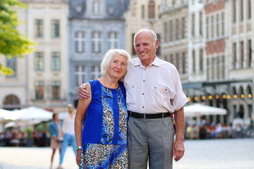 Happy senior couple traveling in Europe