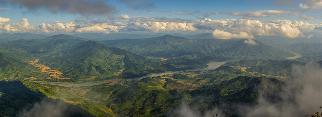 Mekong river and mountains landscape in cloudy day, Chiang Rai province, Thailand, Asia - obrazy, fototapety, plakaty