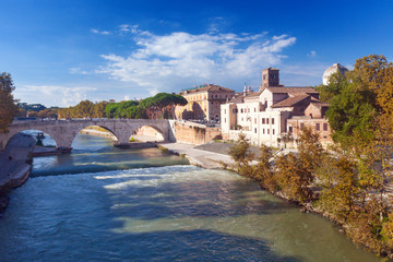 Tiber Island and Pons Cestius bridge in Rome, Italy