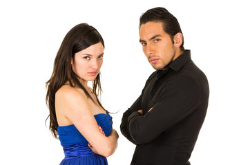 young attractive couple fighting with arms crossed