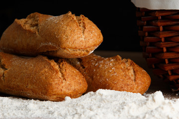 Bread basket on black background