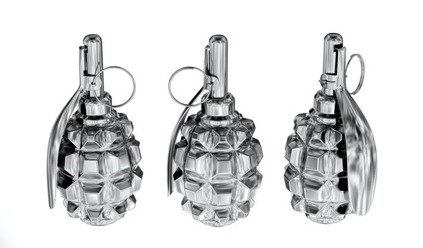 Three polished silver fragmentation grenades in a row