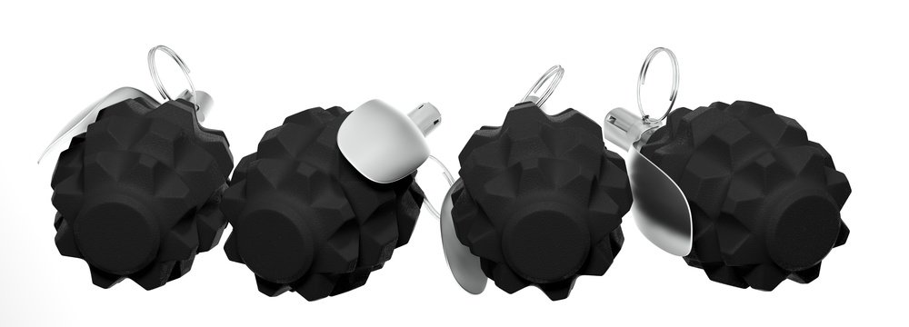 A group of four lying fragmentation grenades