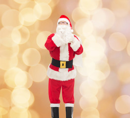 man in costume of santa claus with bag