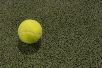 Paddle ball in astroturf court