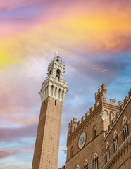 Fototapeta premium Siena. Mangia Tower in Campo Square at dusk