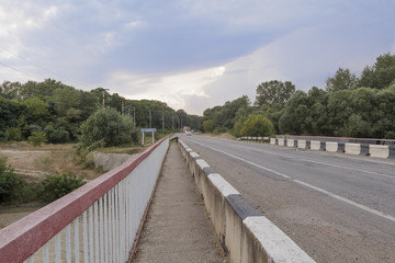 Bridge over a small river in the evening