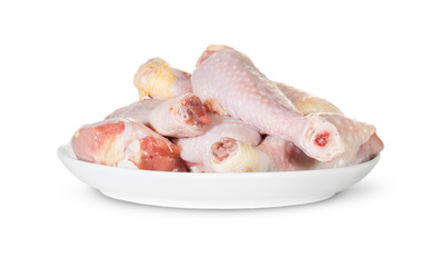 Raw Chicken Legs On White Plate