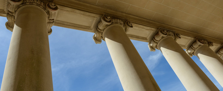 Pillars of Law and Justice with Blue Sky