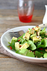 Light salad with spinach and avocado