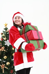 산타 복장을 한 소녀와 선물