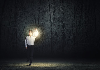 Fototapeta na wymiar Man with lantern