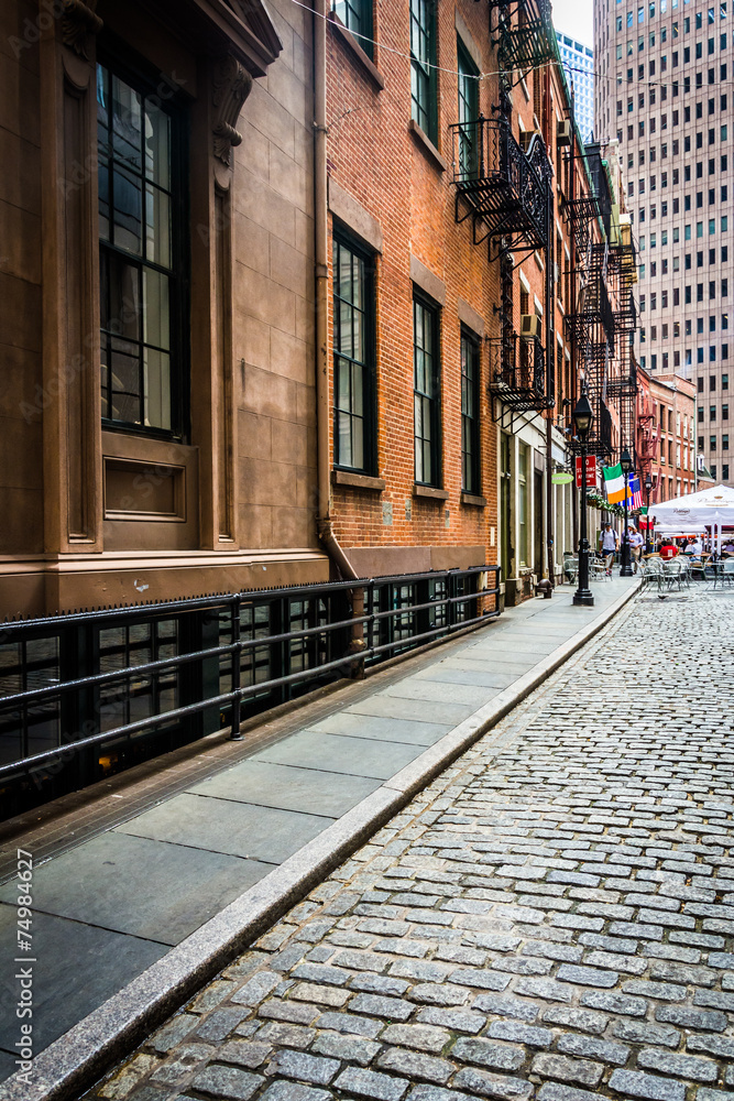 Wall mural stone street, in the financial district of manhattan, new york.