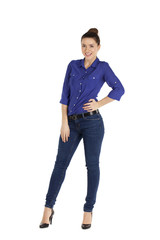 Fototapeta premium Portrait of a beautiful woman in blue jeans and blue shirt