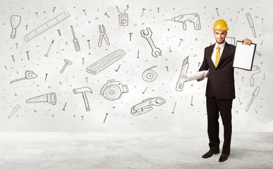 Construction worker planing with hand drawn tool icons