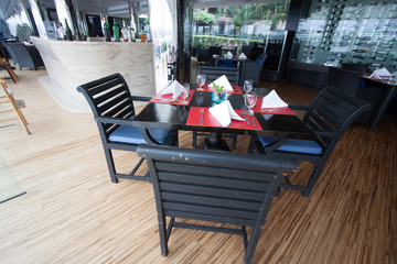 restaurant seats and tables near the river, restaurant interior
