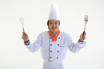 Naklejka premium 스튜디오 안의 남자 요리사 