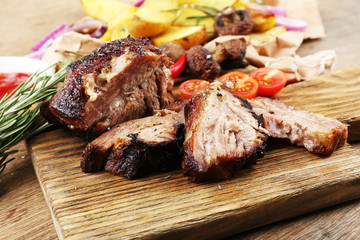 Delicious grilled meat on table