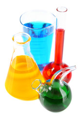 Different laboratory glassware with colorful liquid isolated