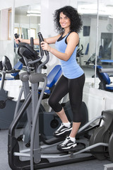 young girl goes in for sports in the gym