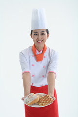 스튜디오 안의 요리중인 남자요리사와 여자요리사