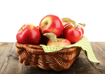 Wicker basket of red apples with napkin
