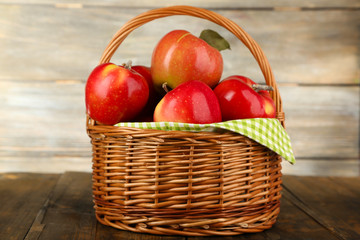 Wicker basket of red apples with green napkin