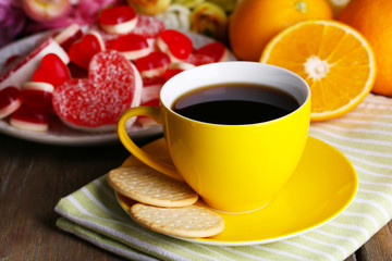 Cup of tea with card that says good morning on table close-up