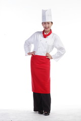 스튜디오 안의 빨간 앞치마를 한 여자 요리사